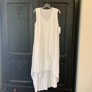 Soft surroundings white dress with sheer angles.